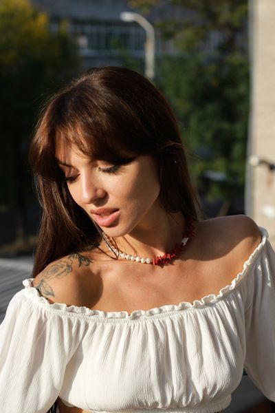 The &laquo;Ariel&raquo; necklace made of natural red coral and pearls.