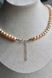 The &laquo;Champagne&raquo; necklace: natural features river pearls in a delicate peach-golden hue