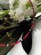 A bold &laquo;Snake&raquo; choker made of red and white coral and spinel